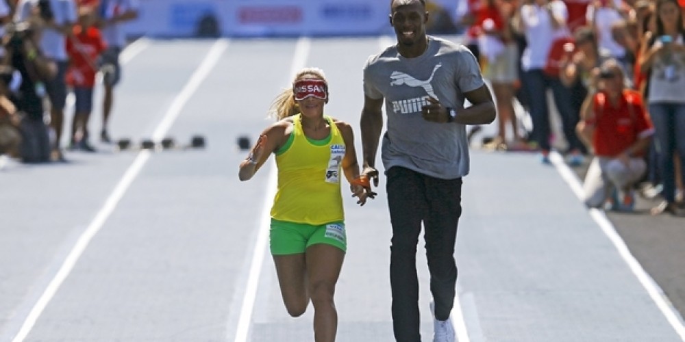 Bolt y la mujer ciega más veloz del mundo corrieron juntos en Rio