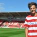 Louis Tomlinson, de One Direction, compr&oacute; al Doncaster ingl&eacute;s